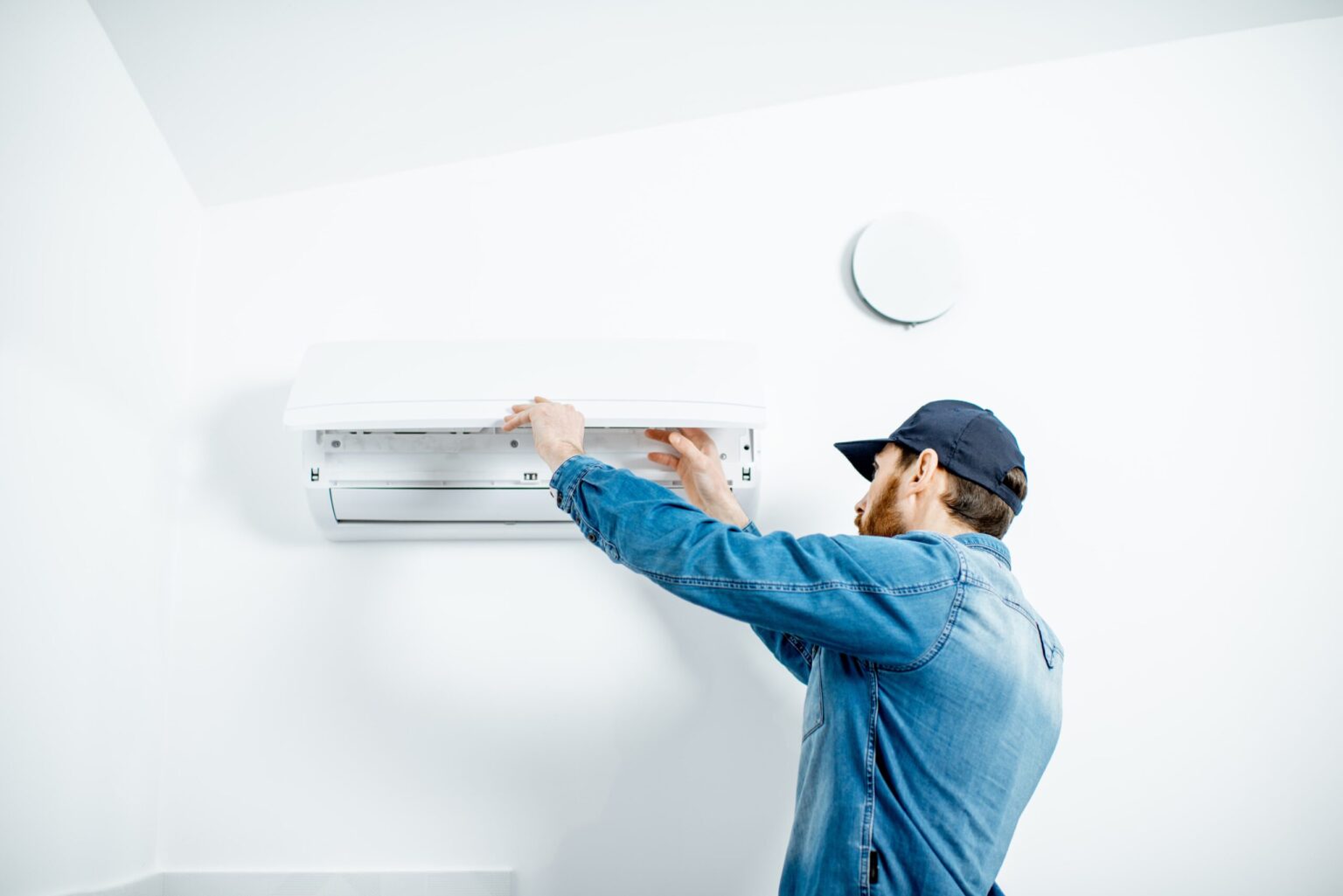 man serving the air conditioner 2021 09 02 06 24 26 utc scaled