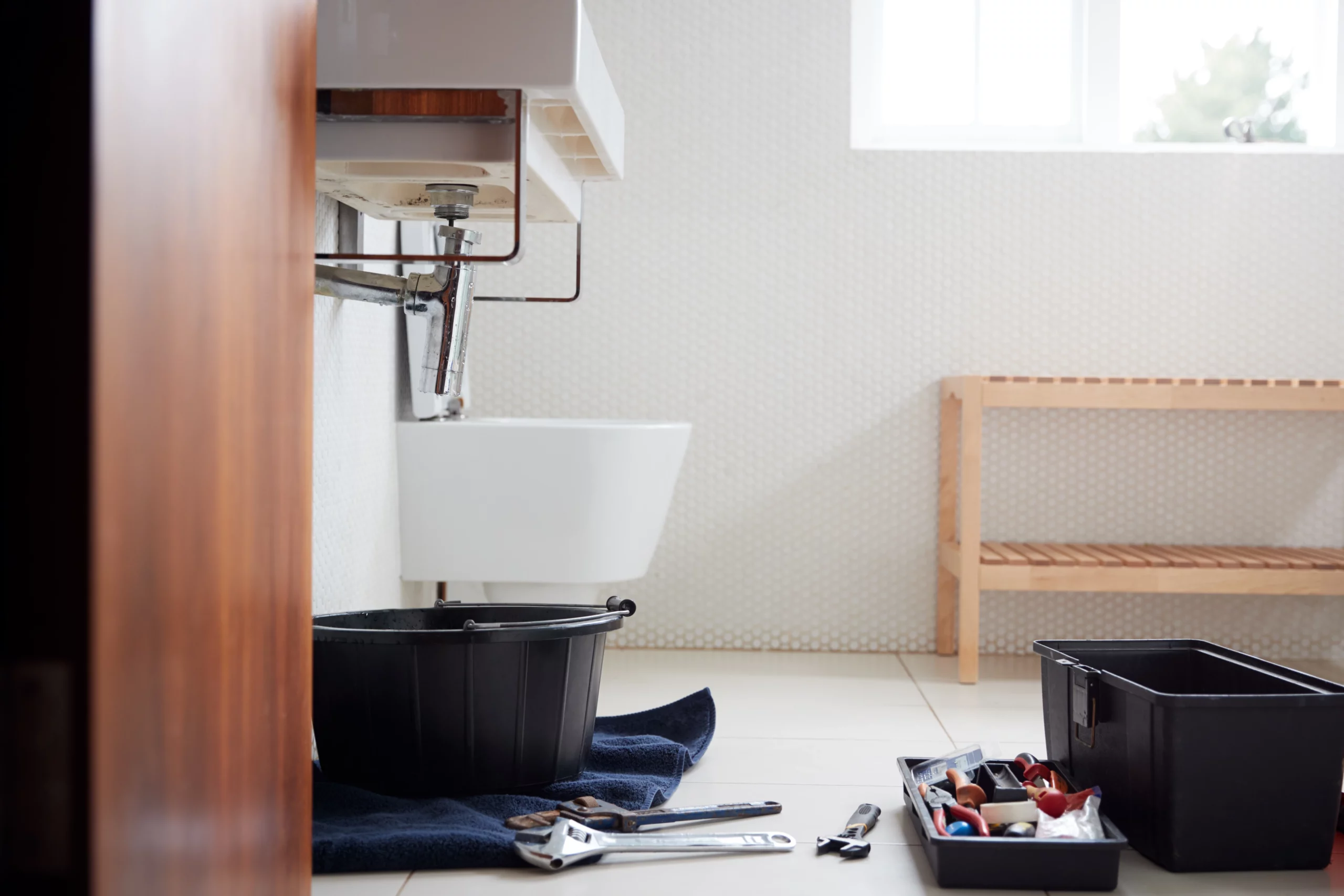 plumbing tools and sink repair in bathroom 2026 03 10 03 15 50 utc scaled